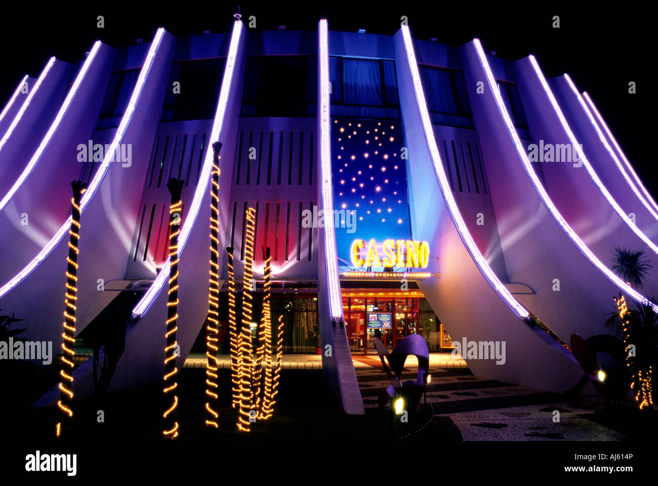 The illuminated entrance to Funchal's unusually designed casino building Stock Photo