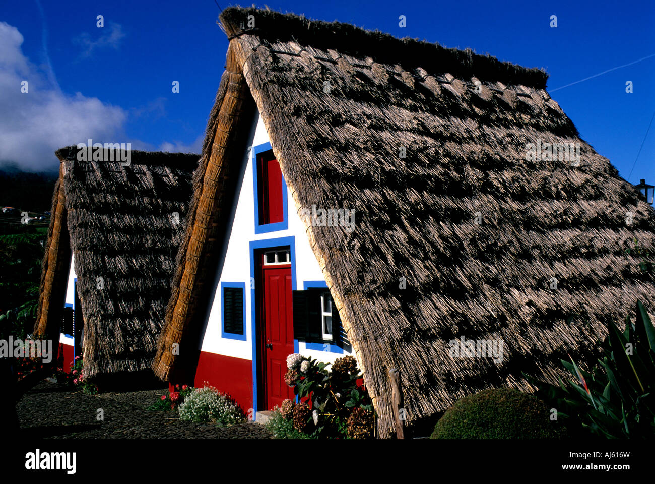 The Triangular A Frame Houses Are Unique To Madeira With Many Stock Photo Alamy