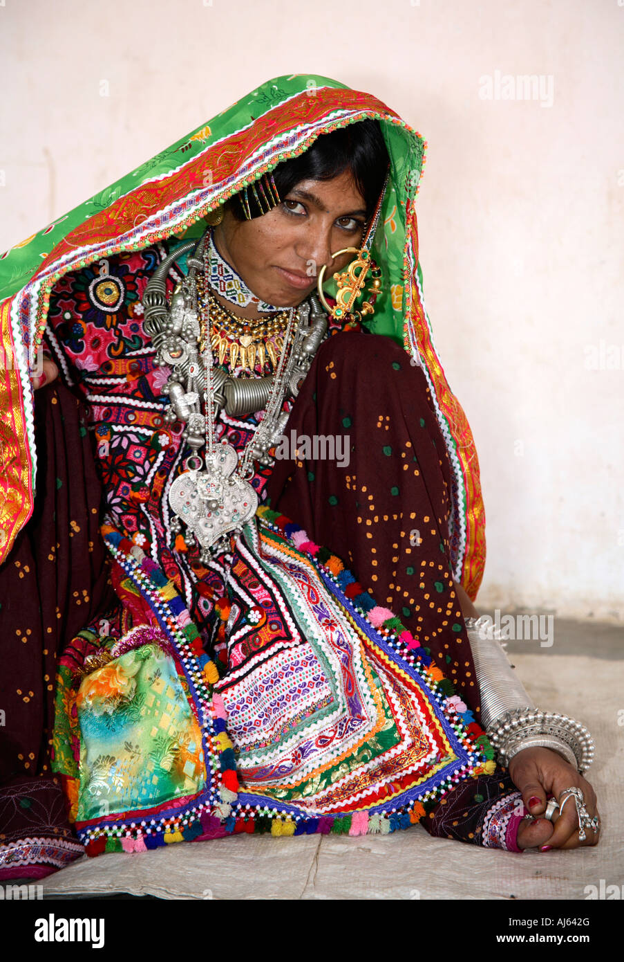 Portrait of young married Harijan Tribal woman wearing huge nose ring in Ludia Village, nr Khavda, Kutch district, Gujarat, India Stock Photo