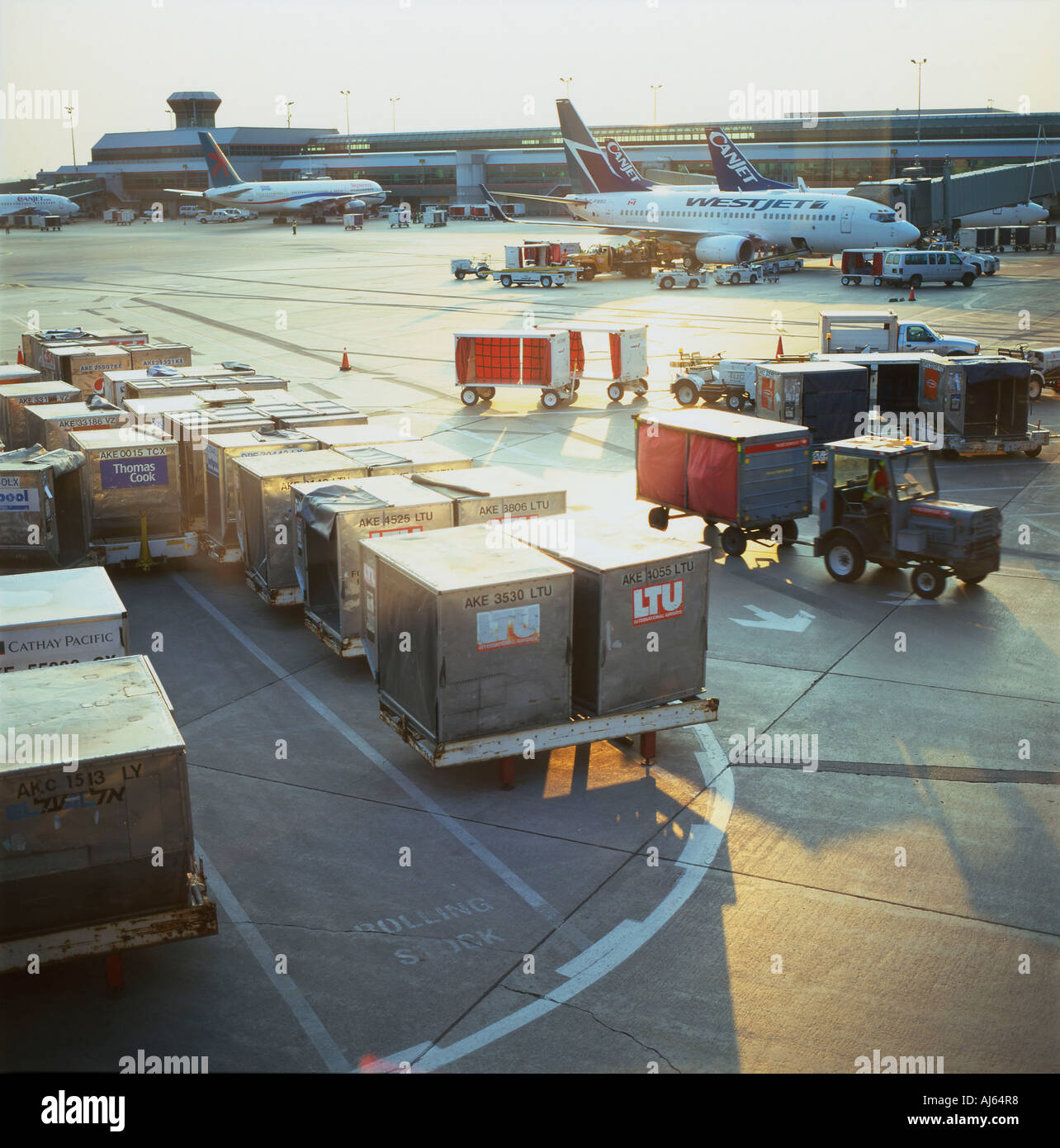 Air cargo and planes loading and unloading outside on the tarmac at Lester Pearson Airport in Toronto Ontario Canada   KATHY DEWITT Stock Photo