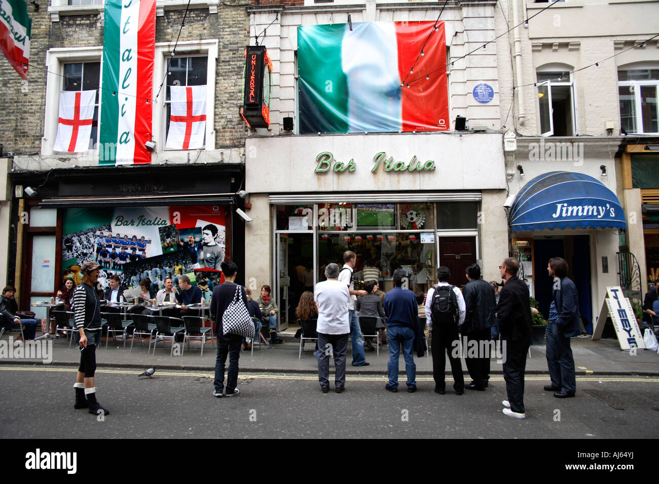 Watching TV screens outside Bar Italia in Soho, London, World Cup Finals, 2006 Stock Photo
