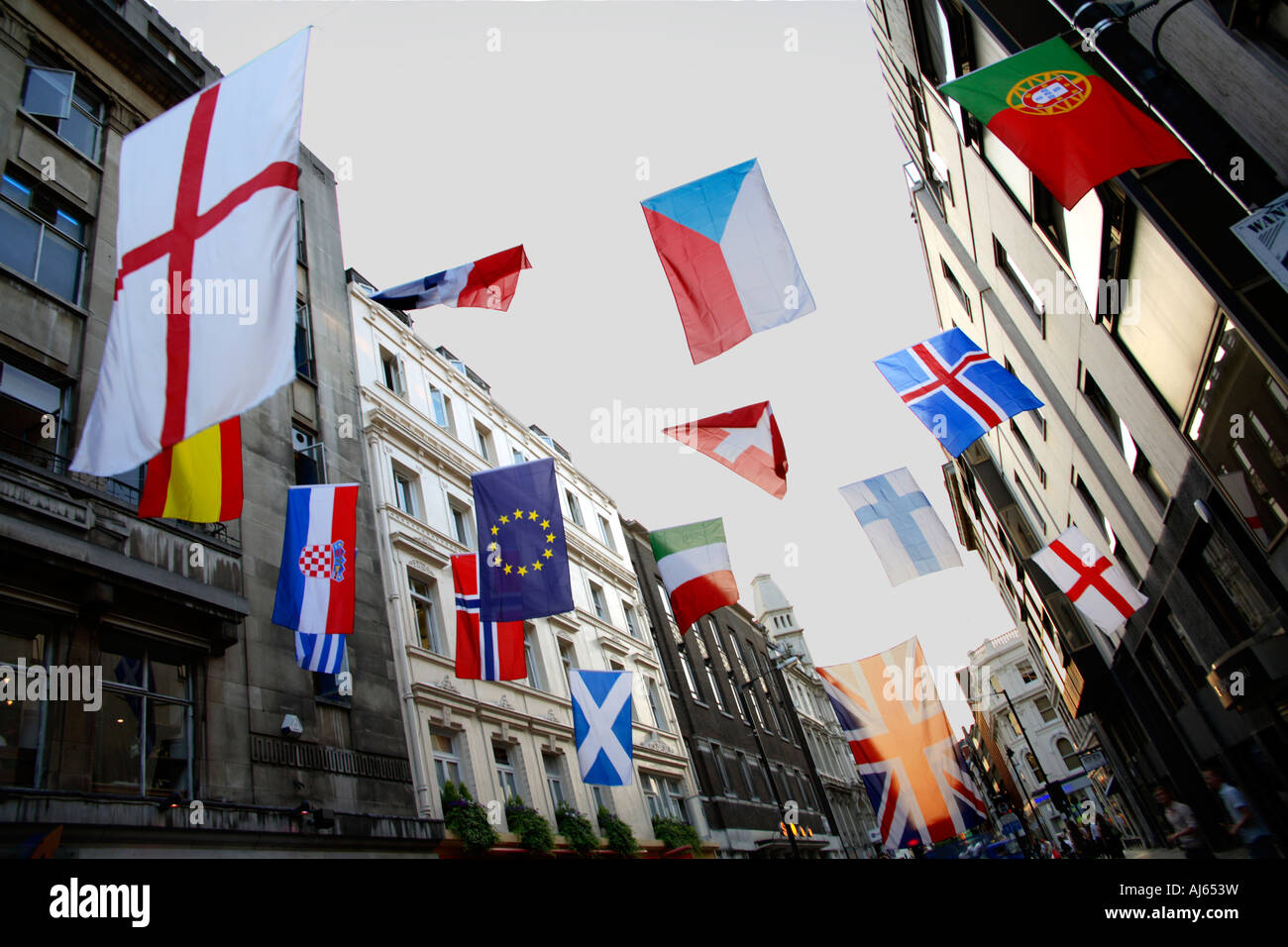National Flags flying between buildings in Soho, London during 2006 World Cup Finals Stock Photo