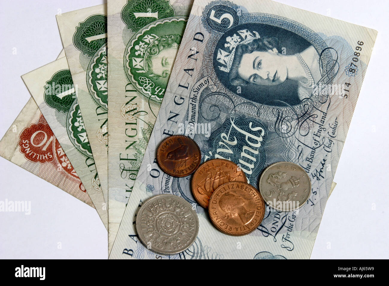 Old English notes and coins from the sixties and seventies. Stock Photo