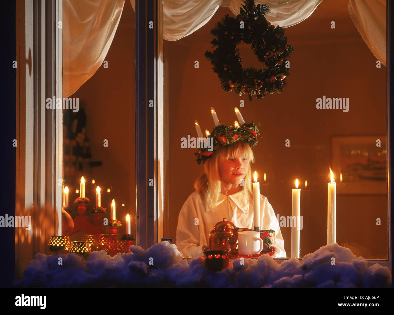 December 13th in Sweden is Santa or Saint Lucia Day when children wear coronets of candles Stock Photo