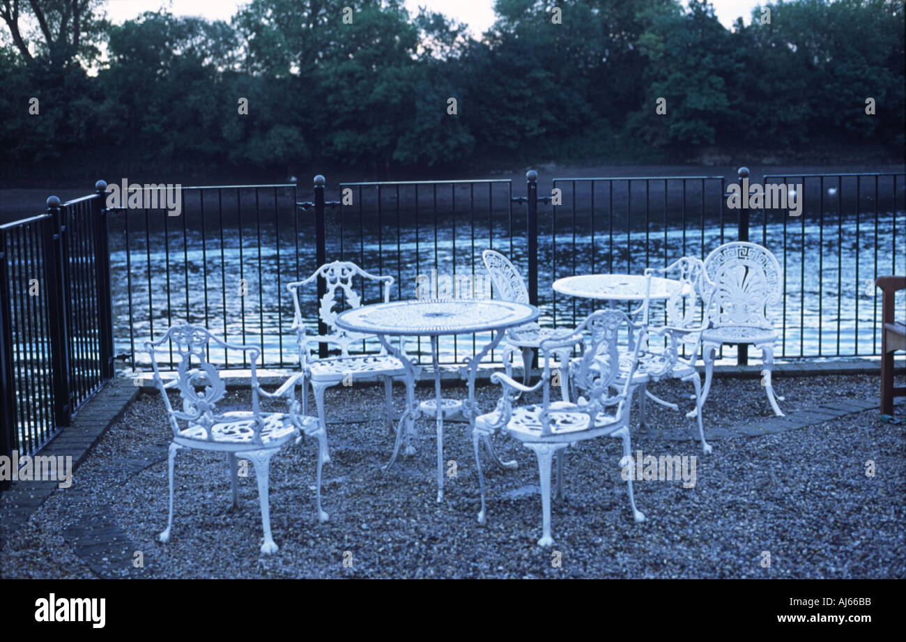 White Chairs and Table By River Thames London UK Stock Photo