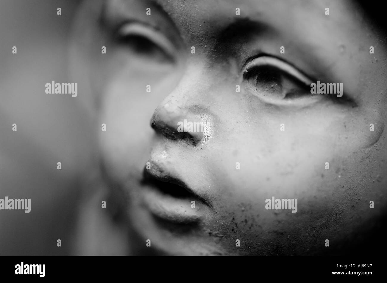 Face of a cherub statue Stock Photo Alamy