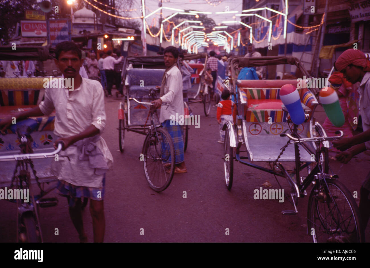Varanasi Rickshaws Cycle rickshaws waiting Varanasi Uttar Pradesh India Stock Photo - Alamy