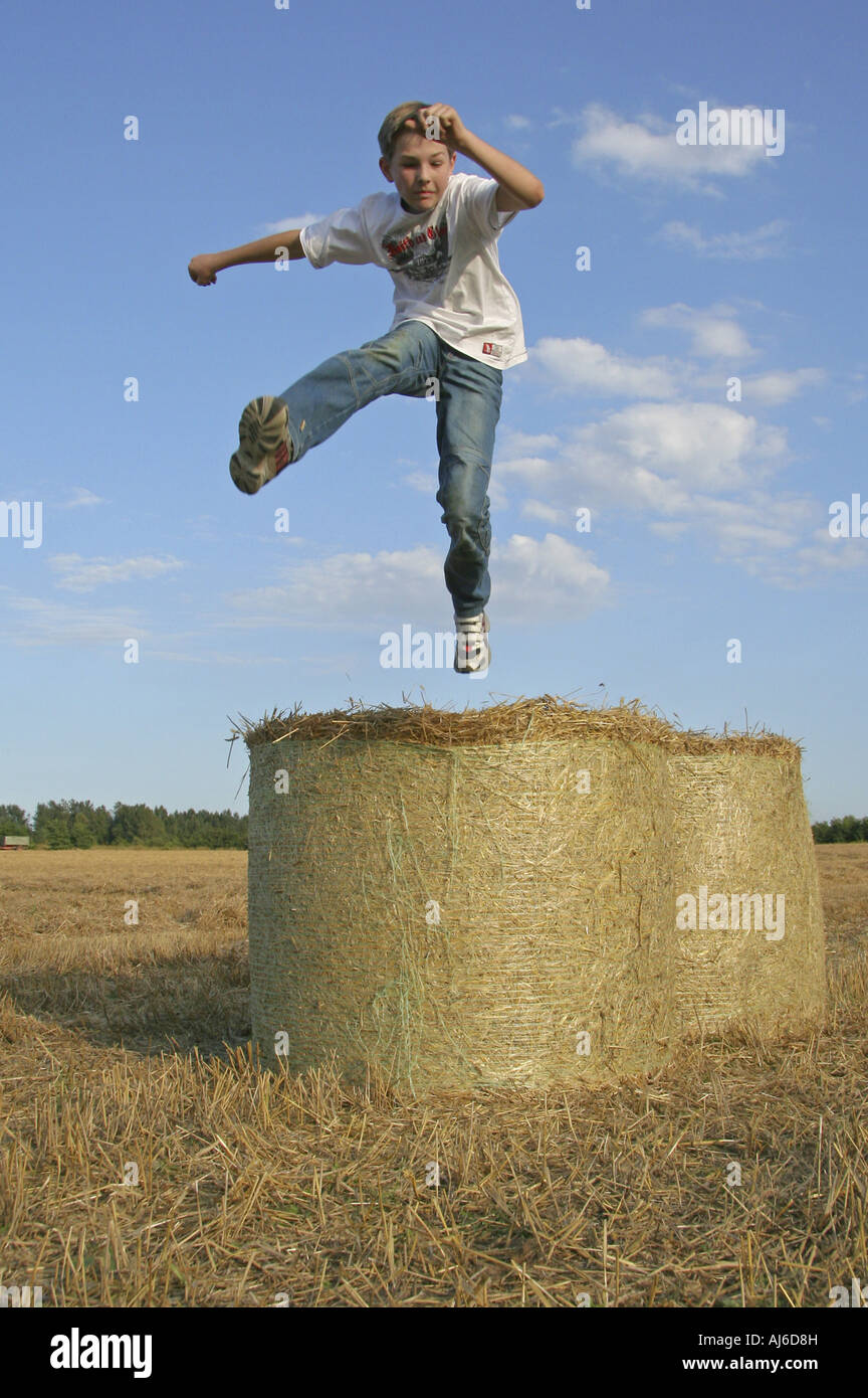 boy cutting a caper, Germany Stock Photo Alamy