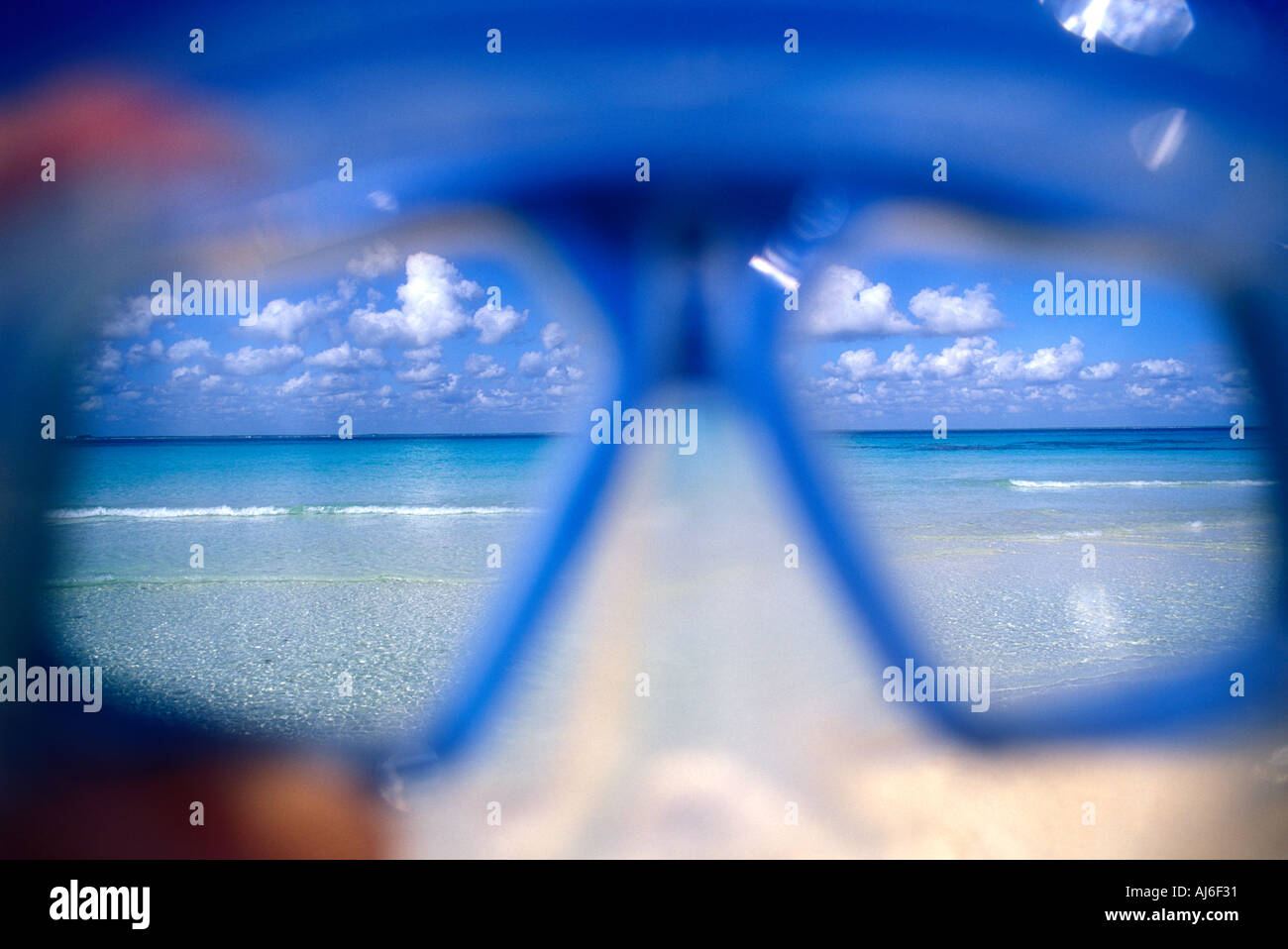 View through snorkeling dive mask of ocean and horizon Cancun Mexico
