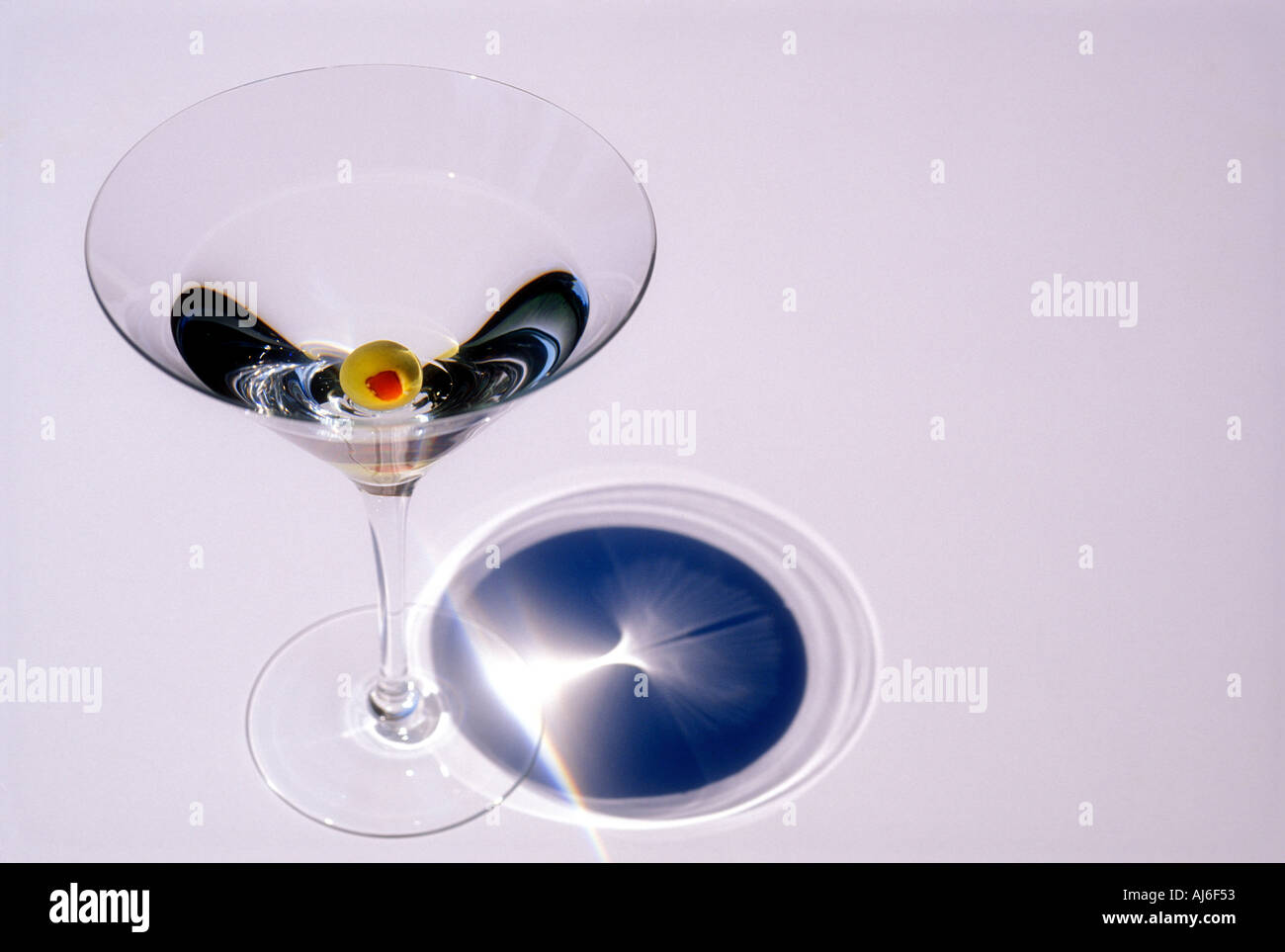 Olive in martini Stock Photo Alamy