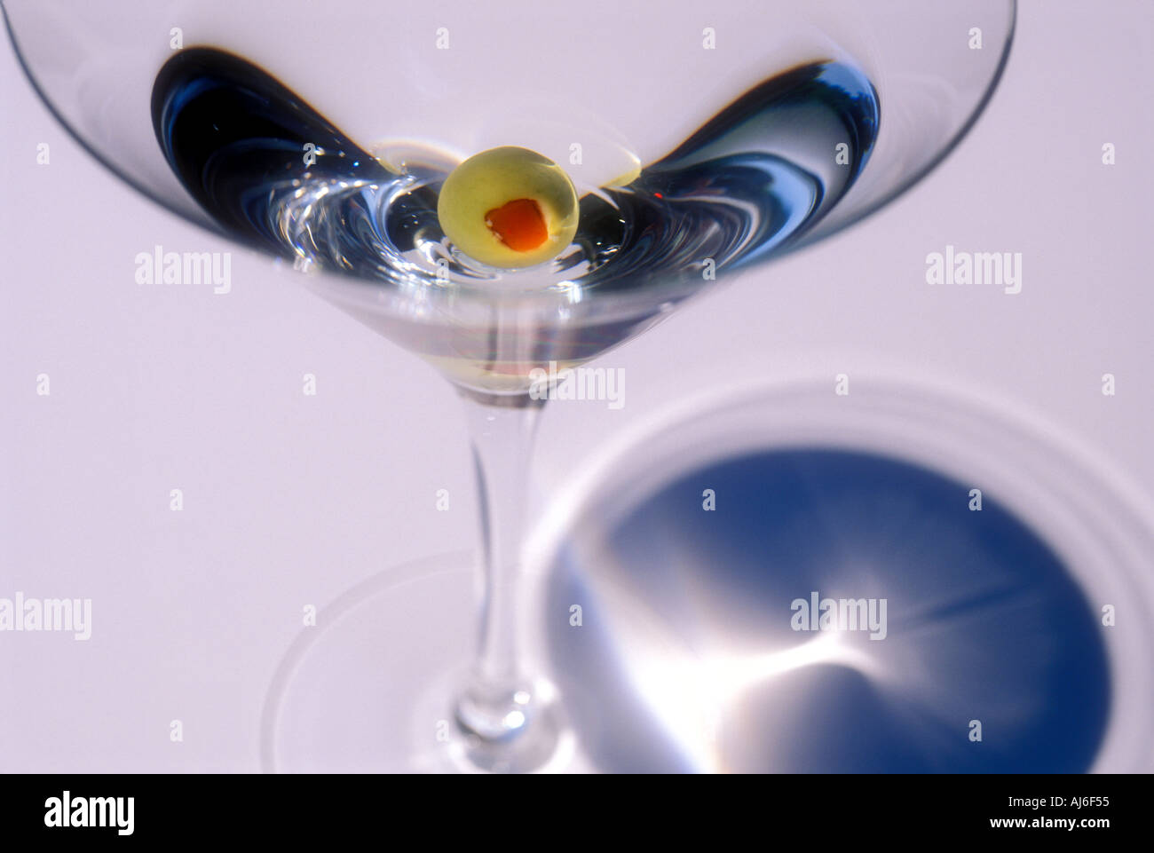 Olive in martini Stock Photo Alamy