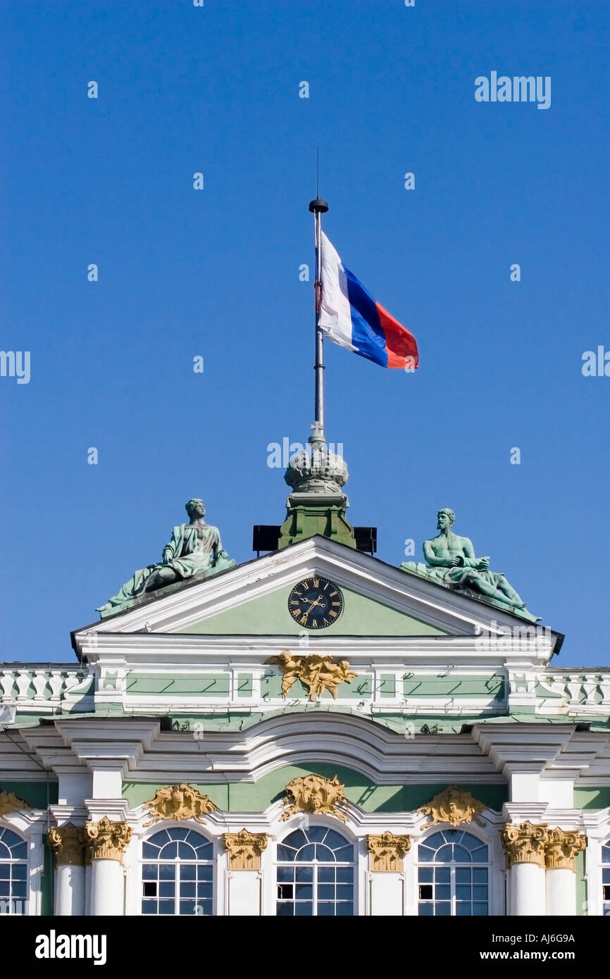 Central pediment and Russian Flag against a blue sky above the Hermitage Palace St Petersburg Russia 2006  Stock Photo