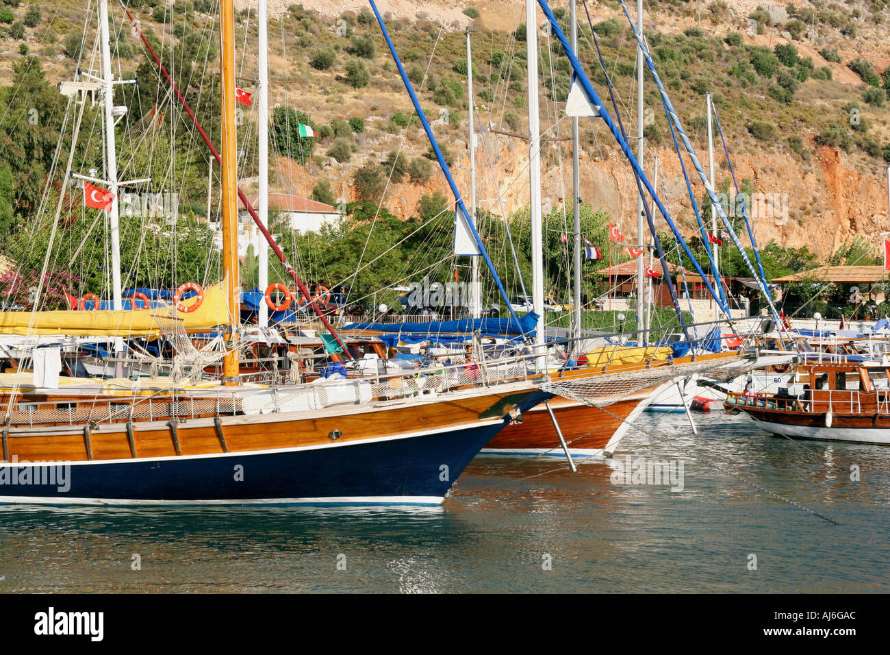 Yachts and gulets moored in Kalkan harbour Turkey  Stock Photo