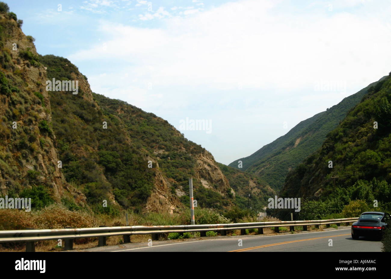 Car driving through canyon Stock Photo Alamy