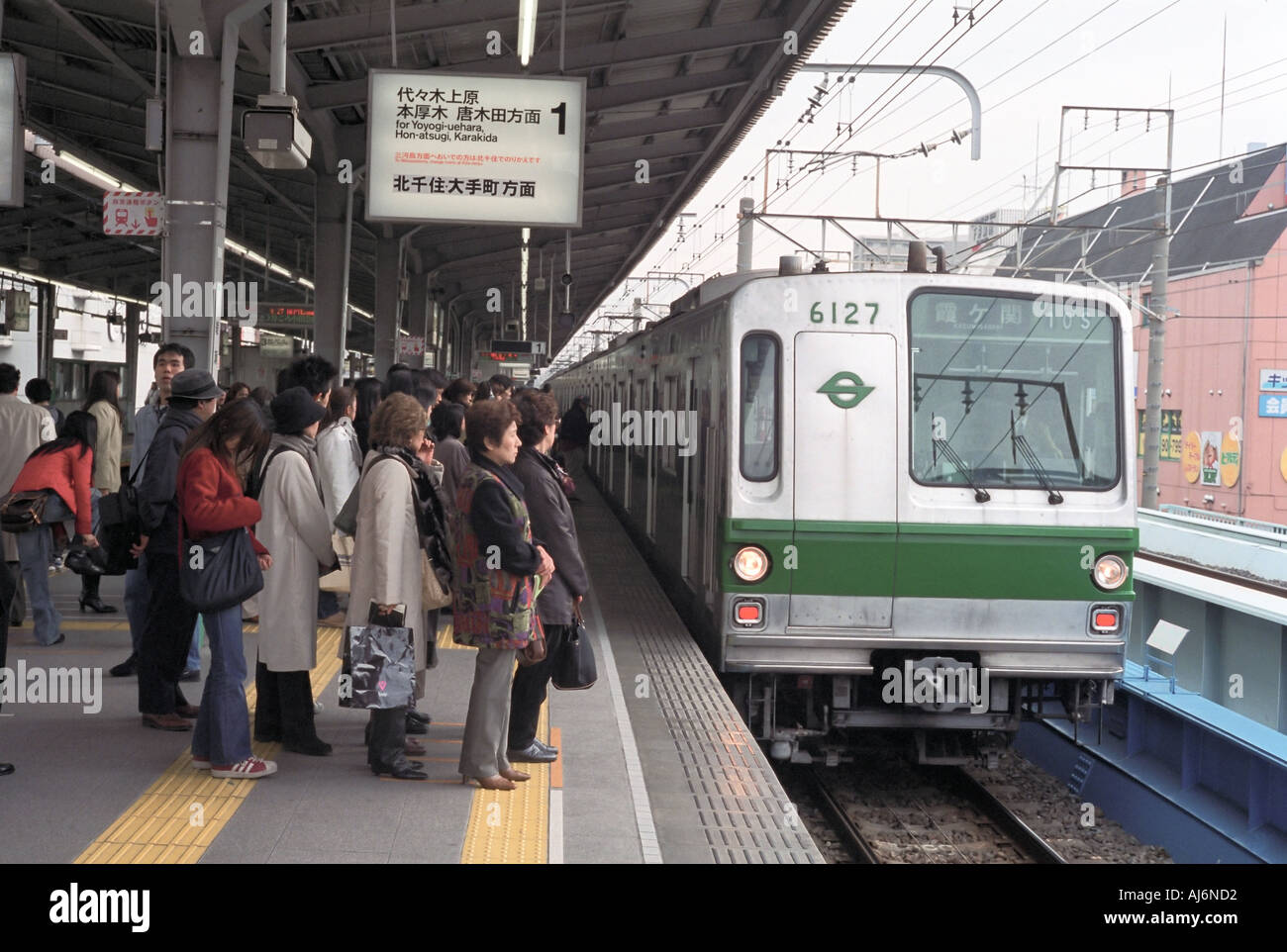 Morning Commuters In A Tokyo Suburb Subway Station Stock Photo Alamy