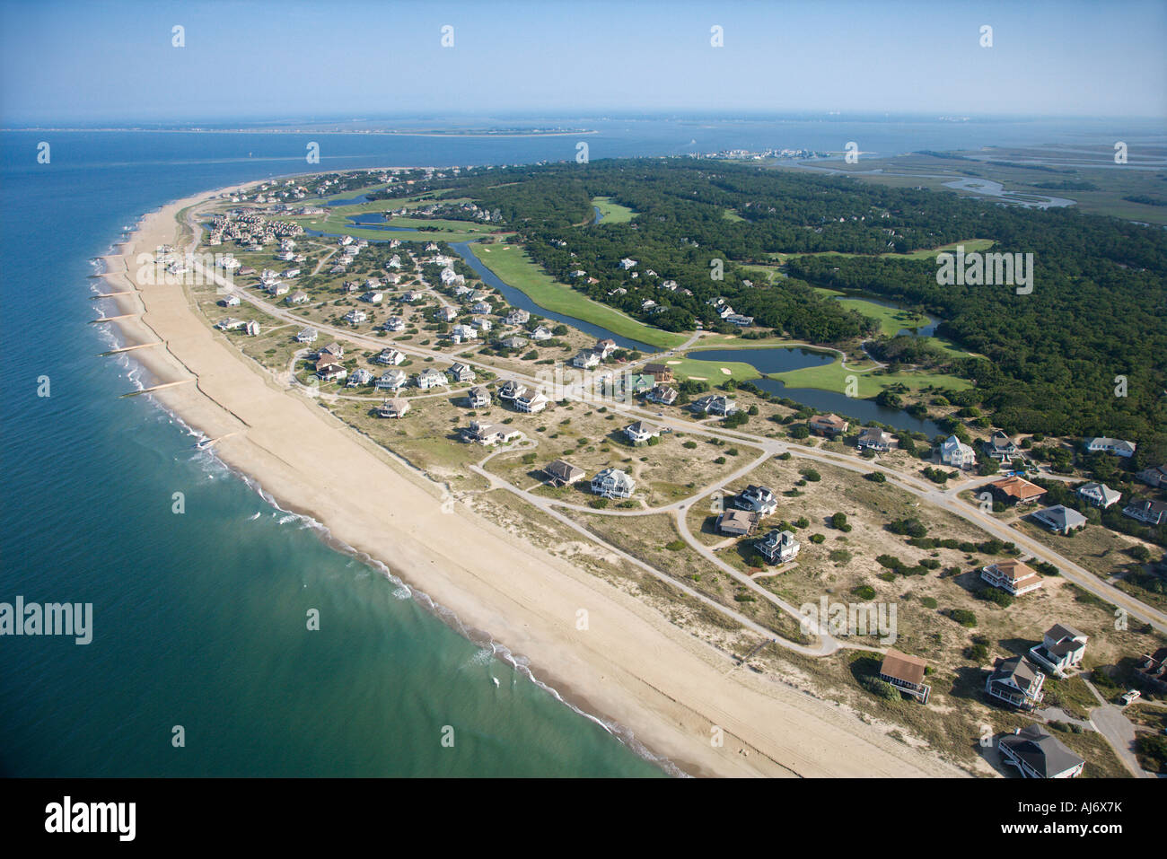 Aerial view of beach and residential neighborhood at Bald Head Island ...