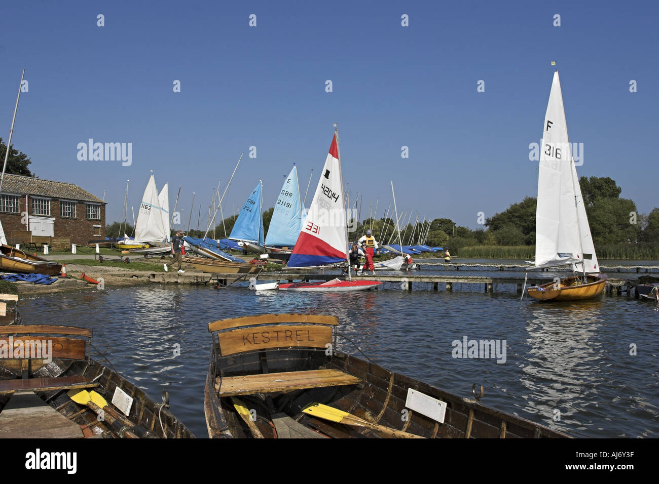 Sailing Dinghies and Rowing boats at Hornsea Mere in East Yorkshire UK