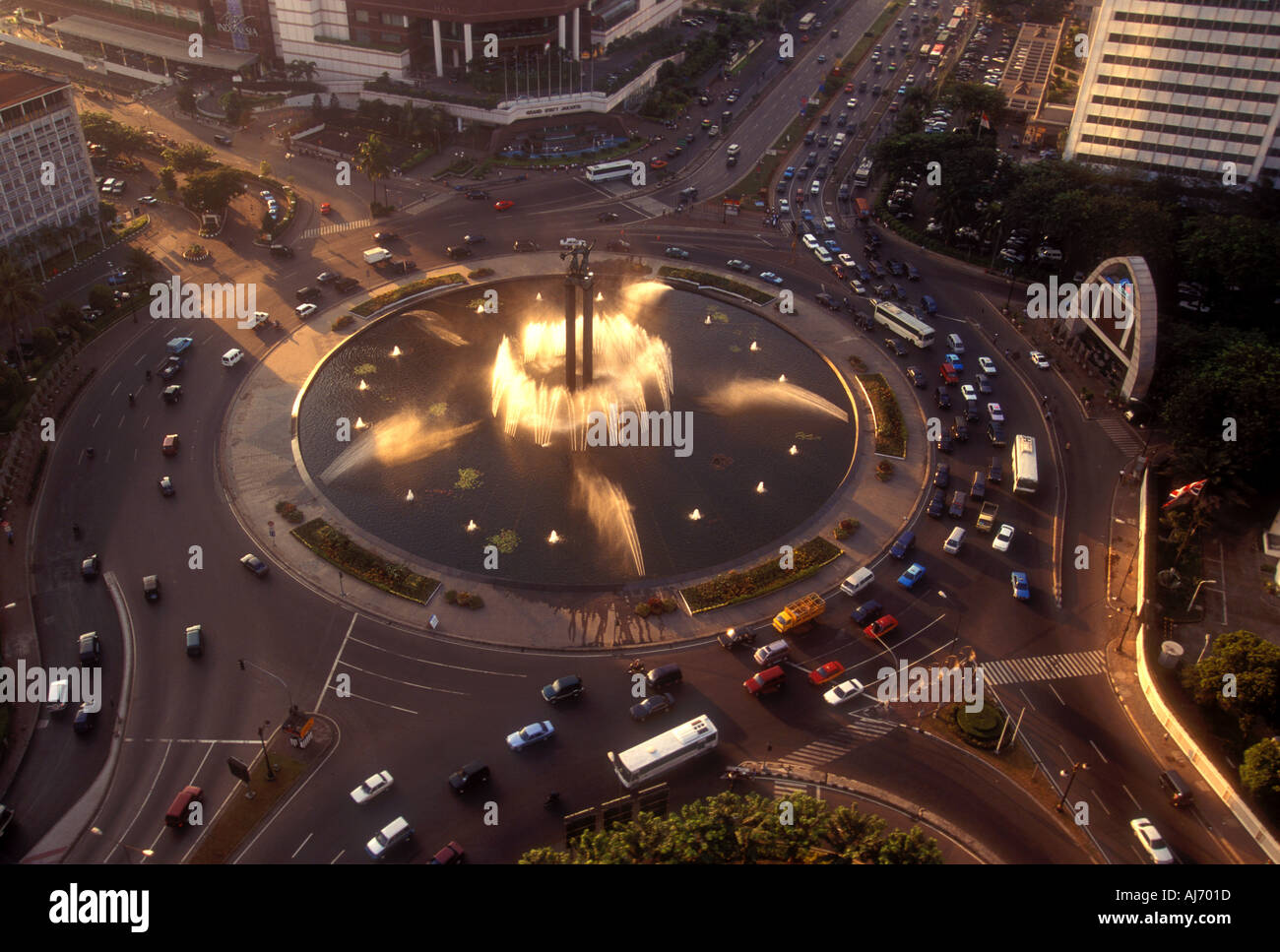 Traffic circle on Jalan Thamrin street in downtown Jakarta Java Indonesia Southeast Asia Stock Photo