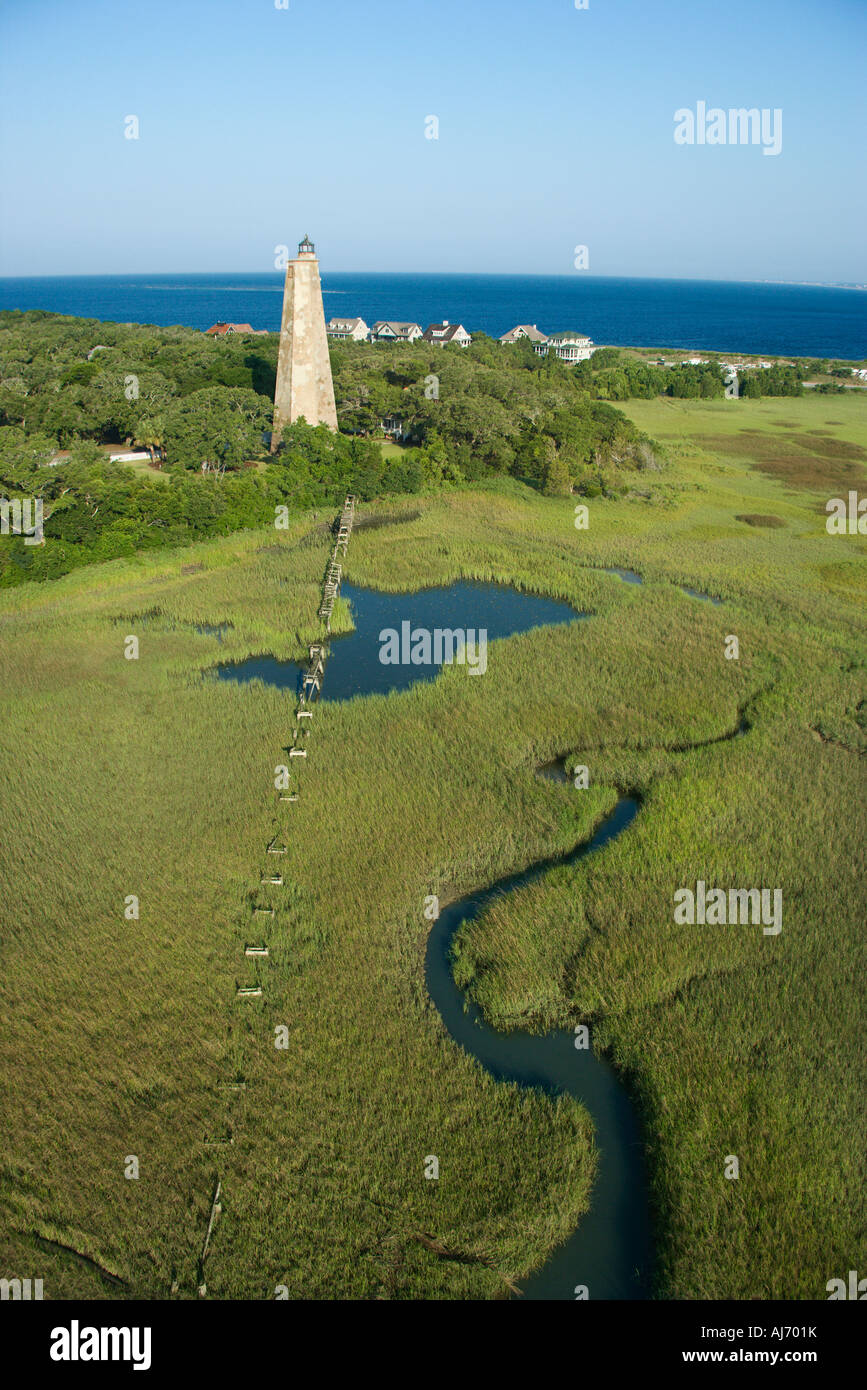 Aerial view of Old Baldy lighthouse in marshy lowlands of Bald Head