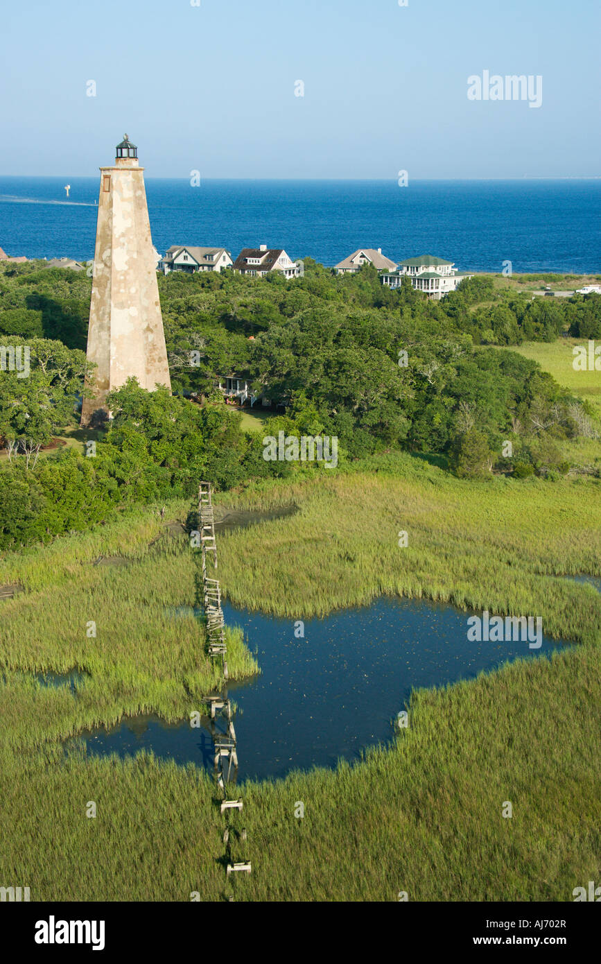 Aerial view of Old Baldy lighthouse in marshy lowlands of Bald Head Aerial view of Old Baldy lighthouse in marshy lowlands of Bald Head