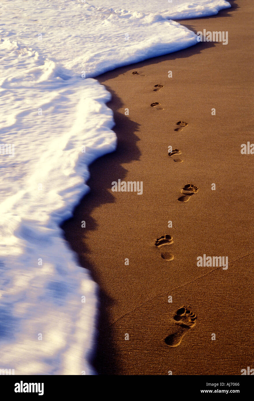 Foot steps along beach beach hi-res stock photography and images - Alamy