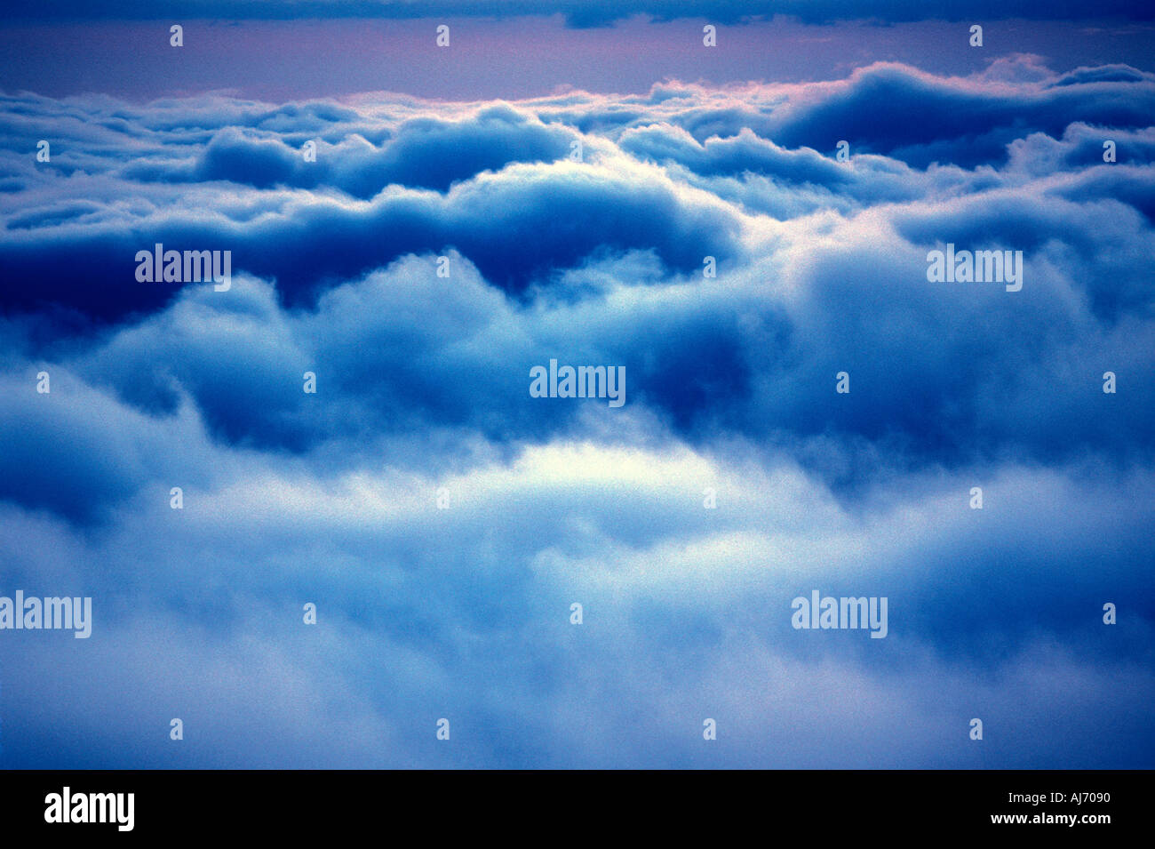View over clouds and sky from Mount Haleakala on the island of Maui in Hawaii USA Stock Photo