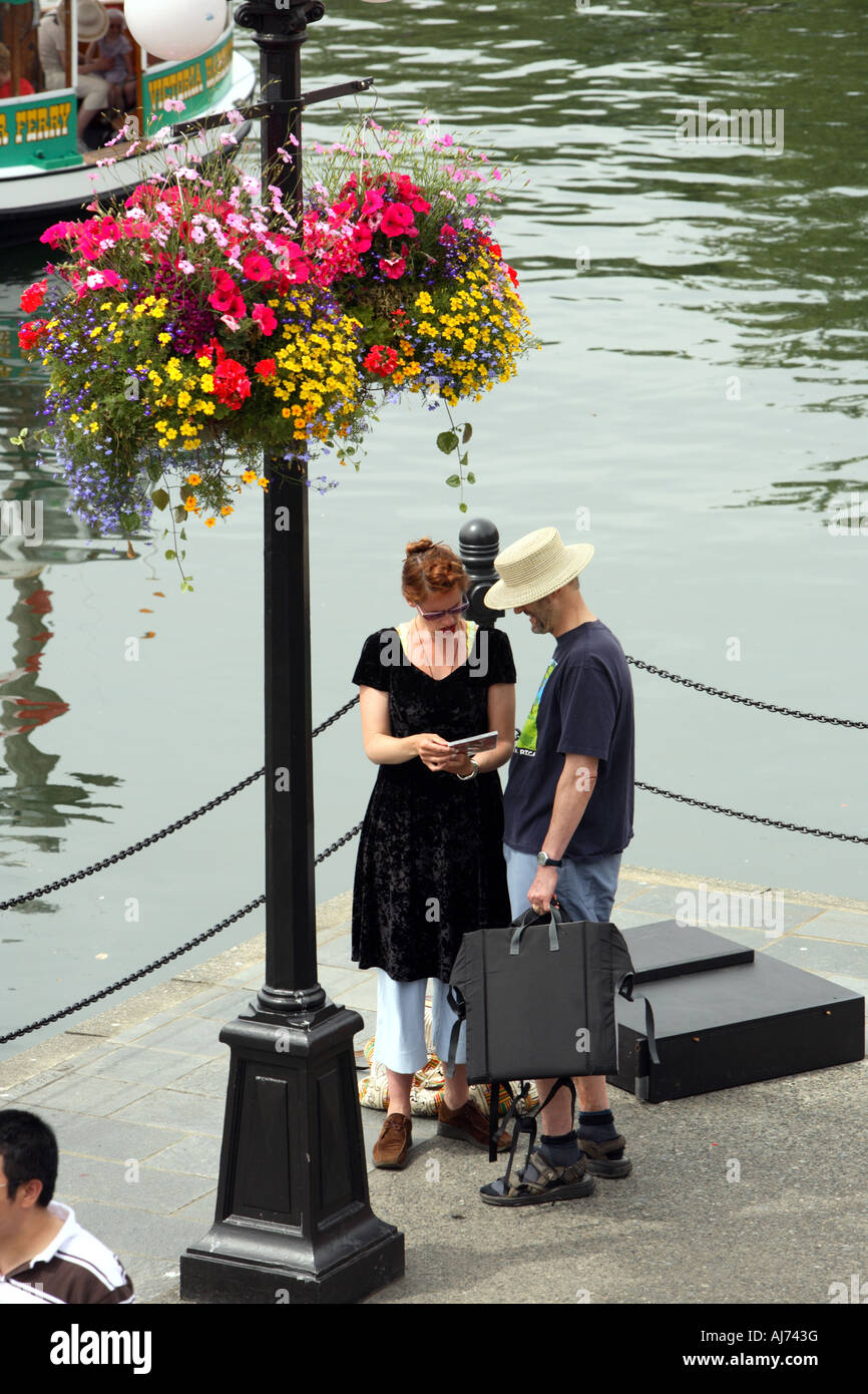 Young couple in downtown Victoria during Canada Day celebration Stock ...