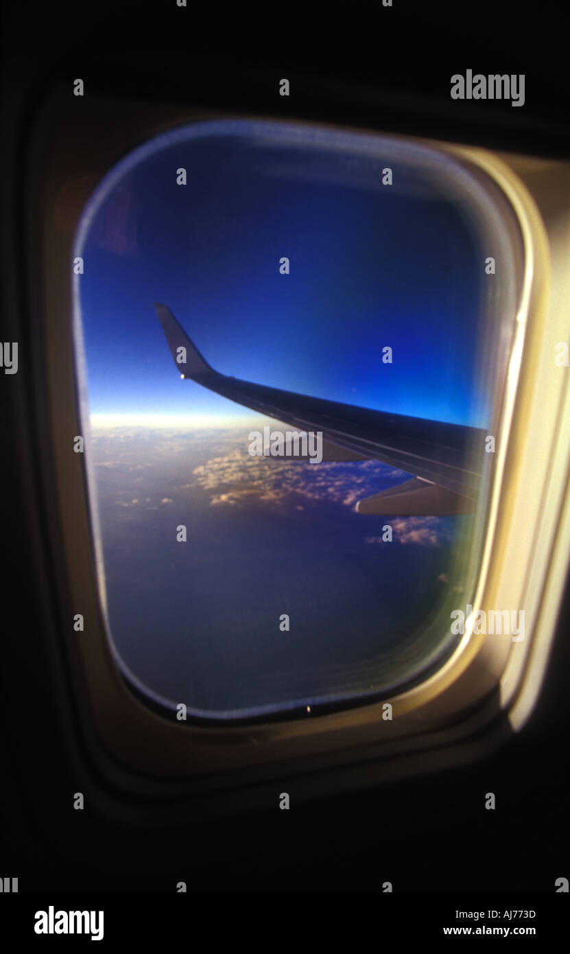 hi high altitude comercial jet wing window seat 2366 Stock Photo