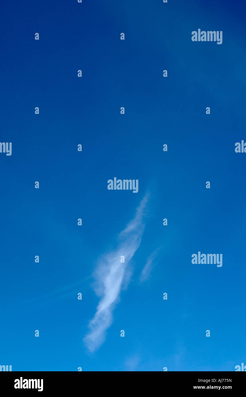 Bright sunny blue sky with fluffy clouds Stock Photo - Alamy