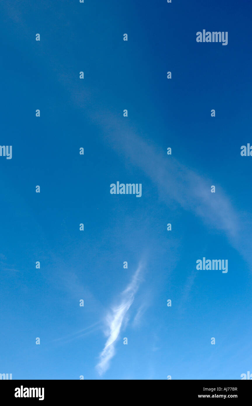 Bright sunny blue sky with fluffy clouds Stock Photo - Alamy
