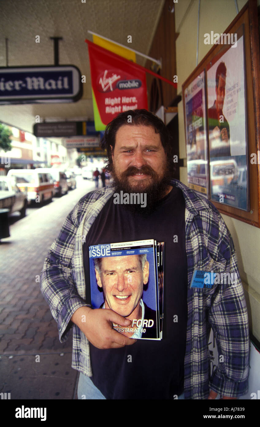 homeless man selling the big issue magazine in Brisbane Queensland Australia 2458 Stock Photo