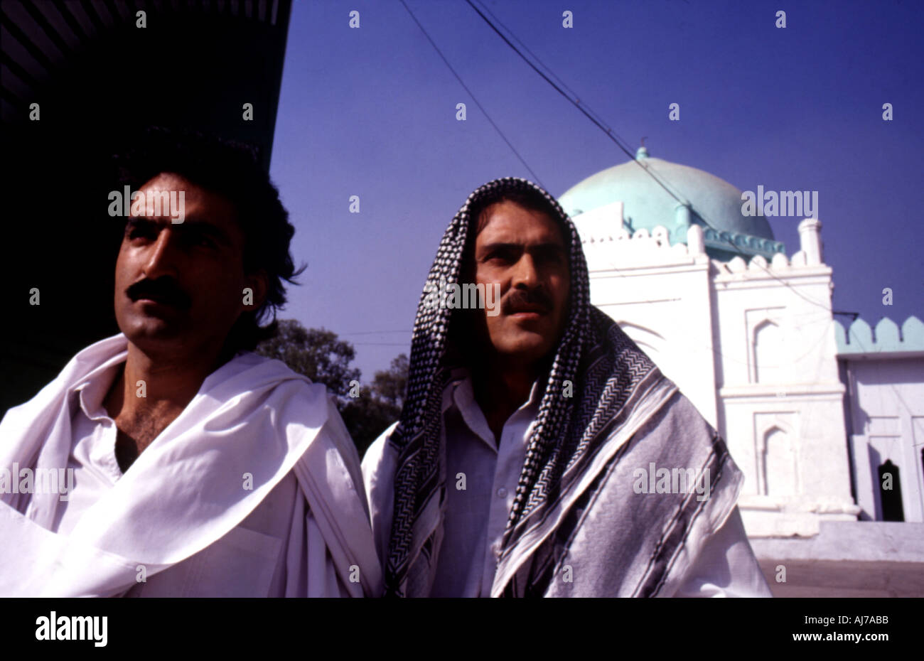 Afghan refugee Rabi with his friend after offering namaz at the Defence ...