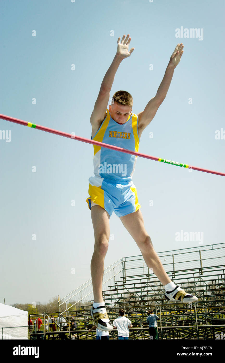 Males Participate in Tack and Field Meet Event Pole Vaulting Stock