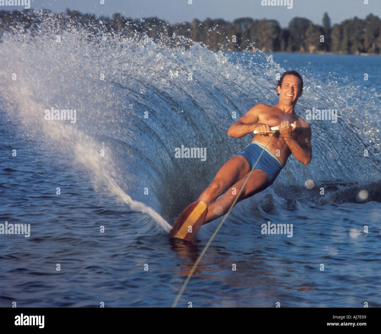athletic male water skier on slalom ski Stock Photo