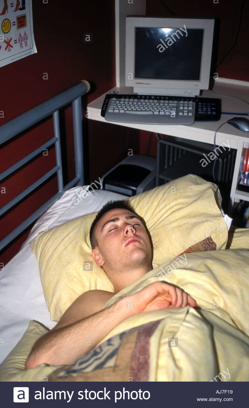 16 year old boy asleep in his bed in bedroom UK Stock ... 16 year old boy asleep in his bed in bedroom UK Stock ...