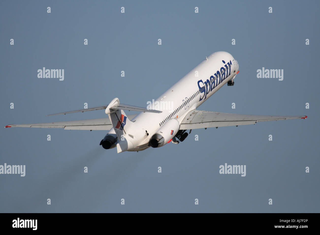 Spanair McDonnell Douglas MD-83 trailing exhaust on departure Stock Photo