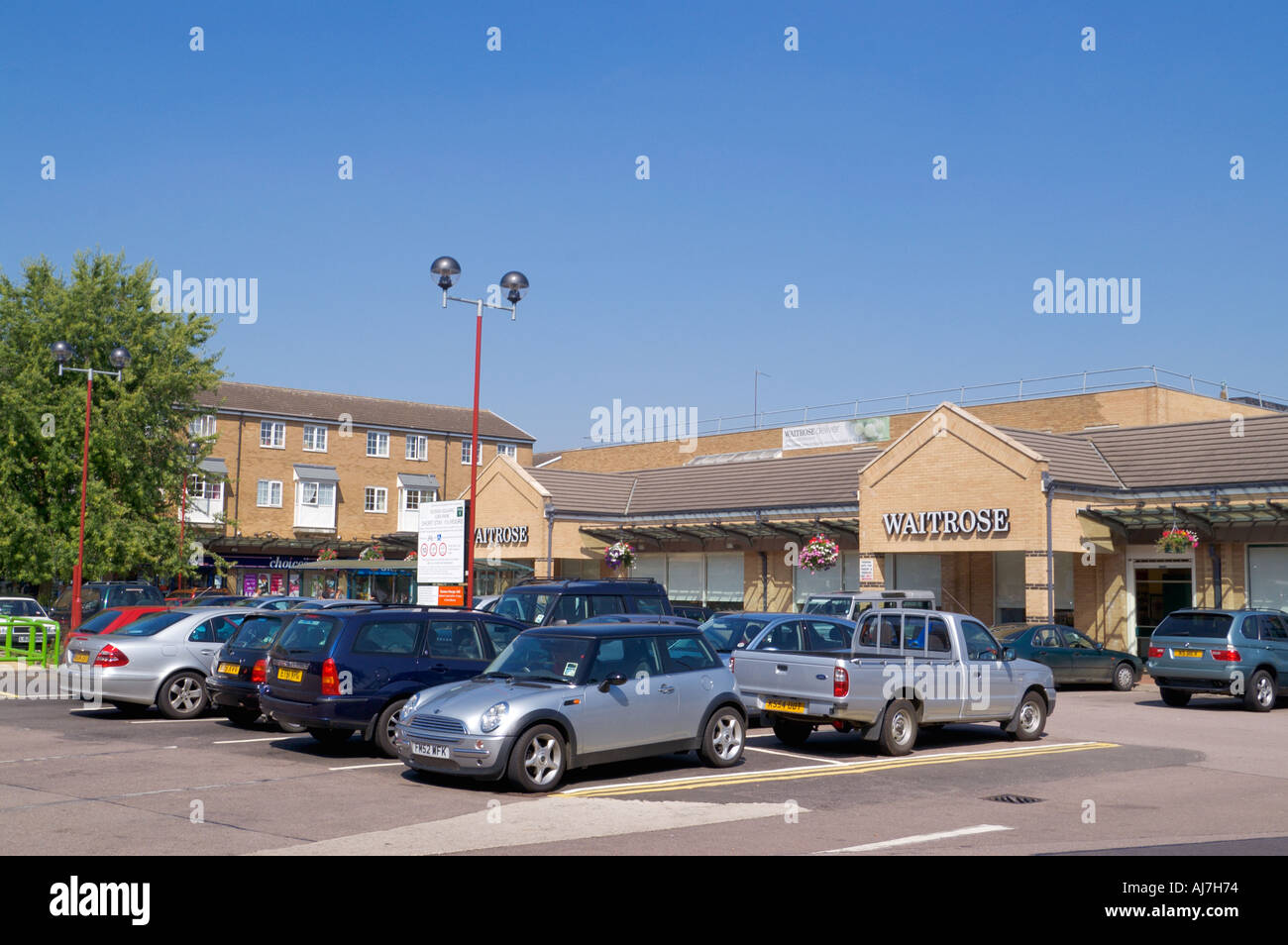 Town centre car park and shopping square Daventry Northamptonshire England Stock Photo