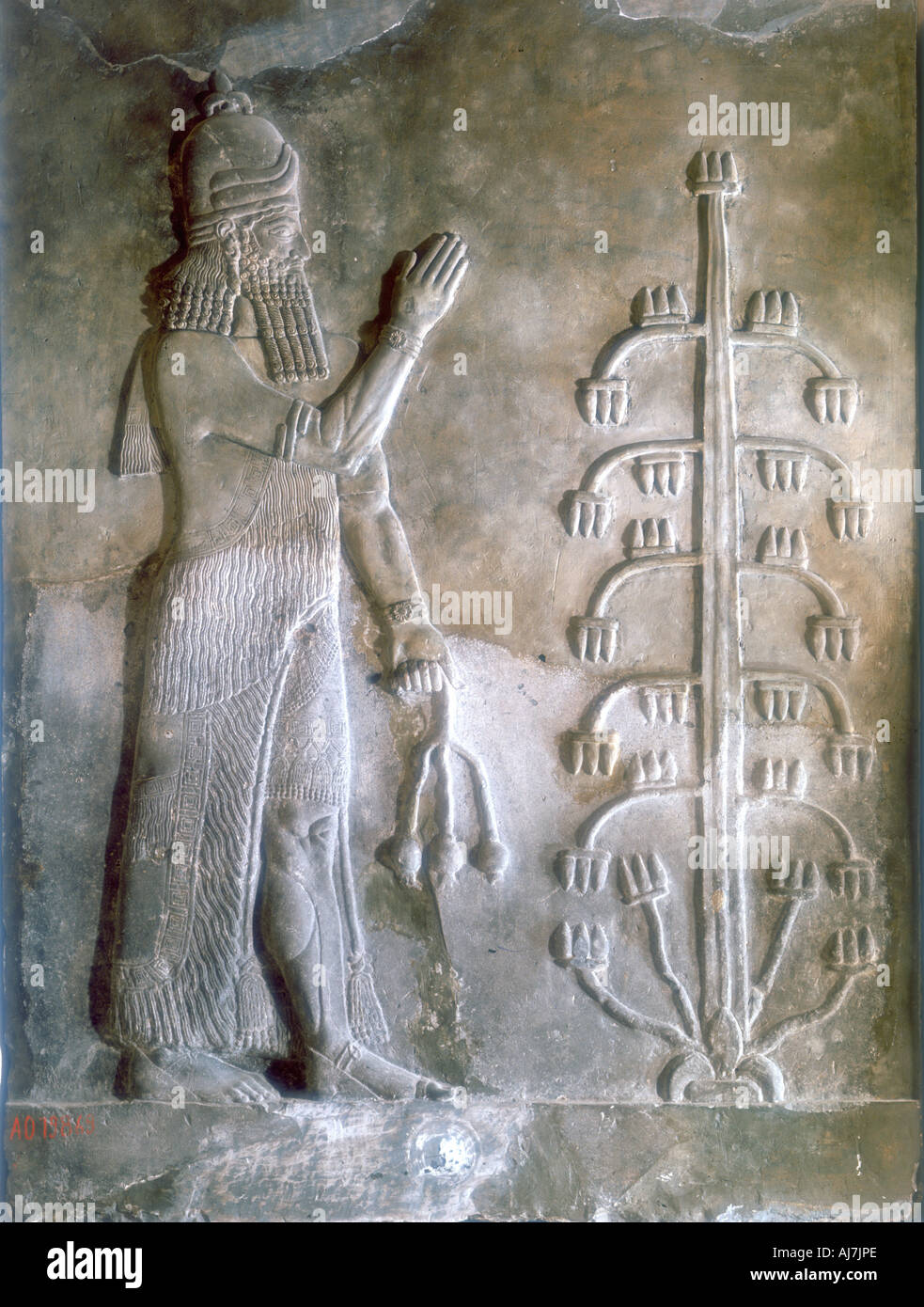 Stone relief of Sargon I standing before a tree of life, 24th-23rd century BC. Artist: Anon Stock Photo