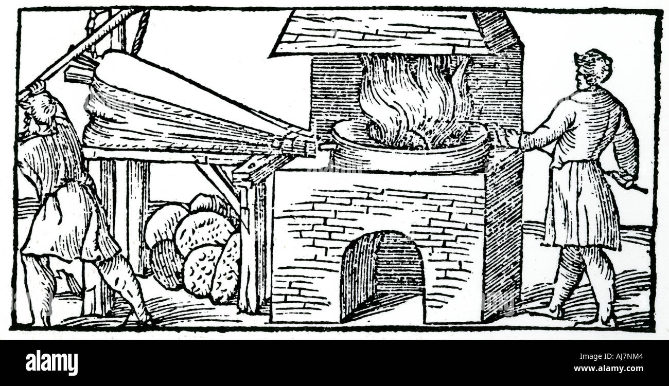 Using bellows to increase the draught in a furnace, 1540. Artist: Unknown Stock Photo
