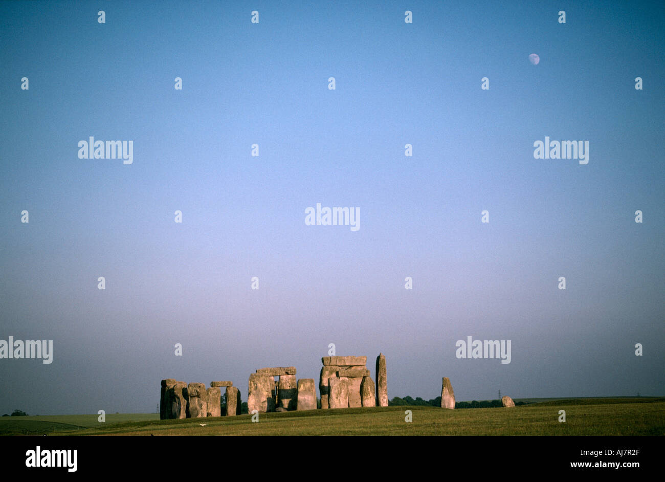 sunset with moon at Stonehenge Wiltshire UK Stock Photo - Alamy