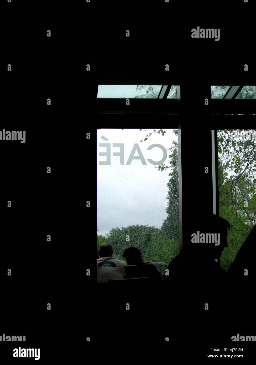 Cafe scene with silhouettes and window Stock Photo - Alamy
