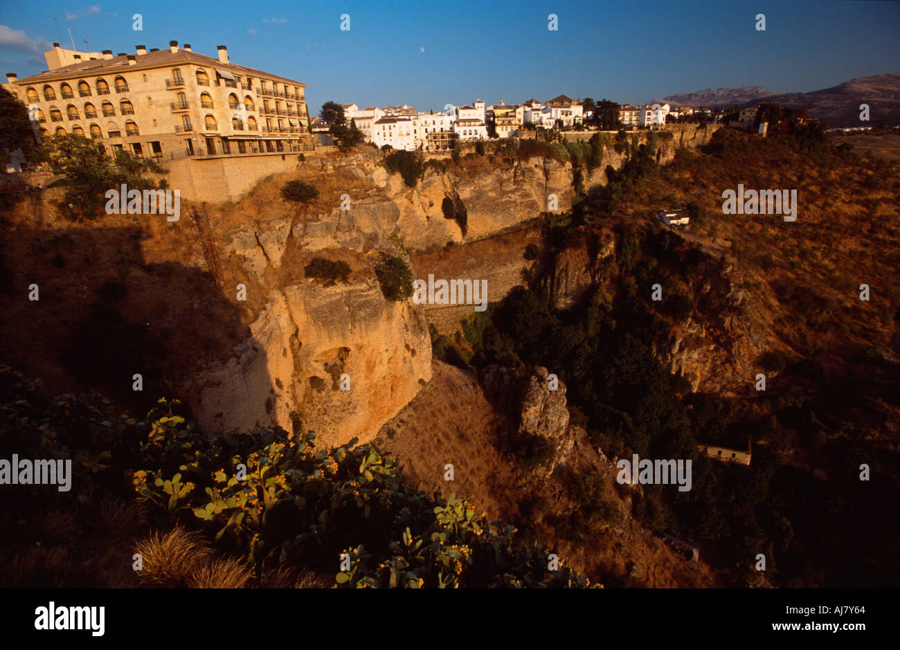 Looking out from the top of the cliffs showing the Parador, Ronda, Andalucia, Spain Stock Photo