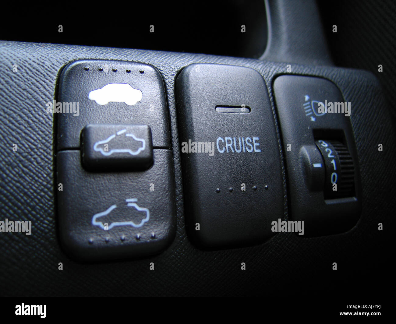 Dashboard switches for cruise control sunroof and light adjustment