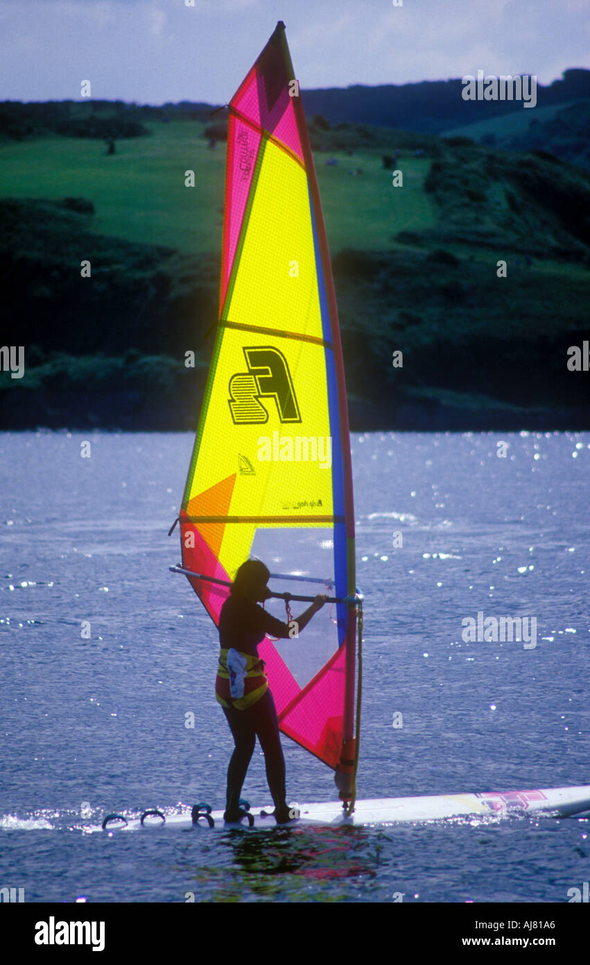 Female windsurfer, England Stock Photo