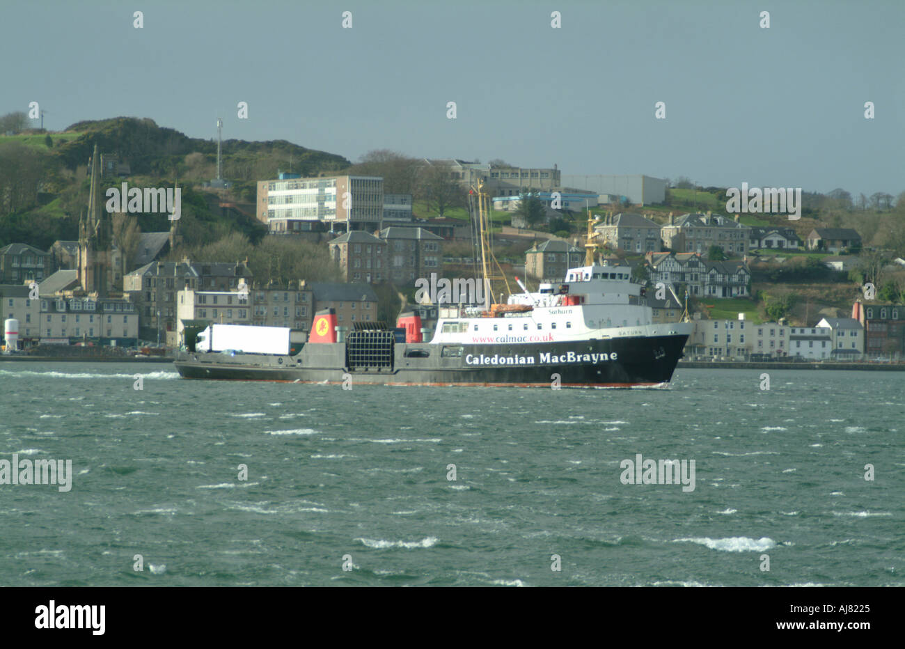 Car Ferry MV Saturn leaves Rothesay on a stormy February day Stock Photo