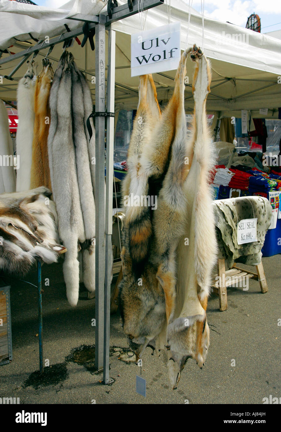 Wolf pelts on sale in an outdoor market in Bergen, Norway Stock Photo