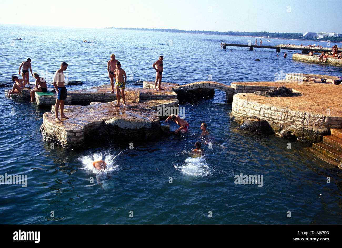 People having fun at beach near Porec Istria Croatia Stock Photo - Alamy