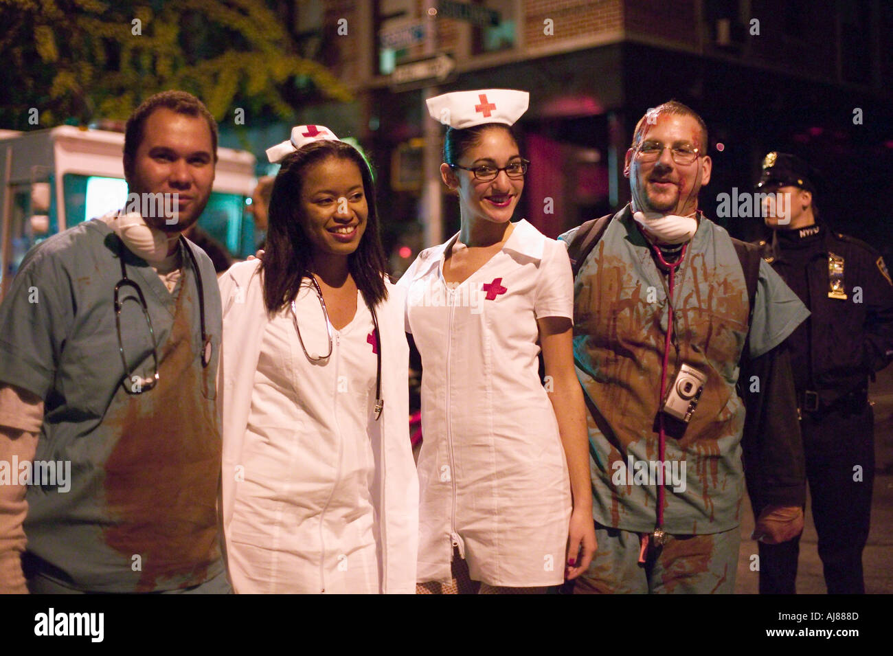 Two couples dressed in hospital ER emergency room surgical scrub garb