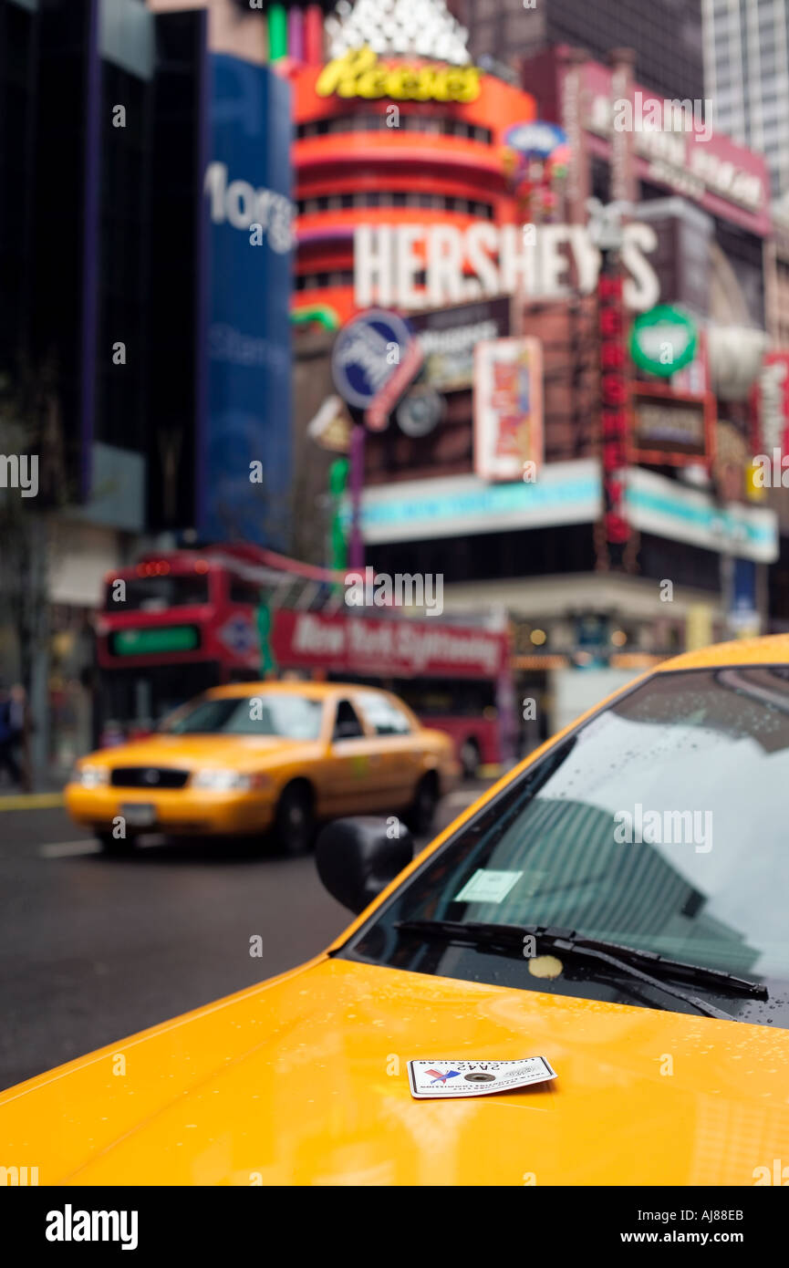 Taxi cabs on Broadway in Times Square Midtown Manhattan New York NY Stock Photo