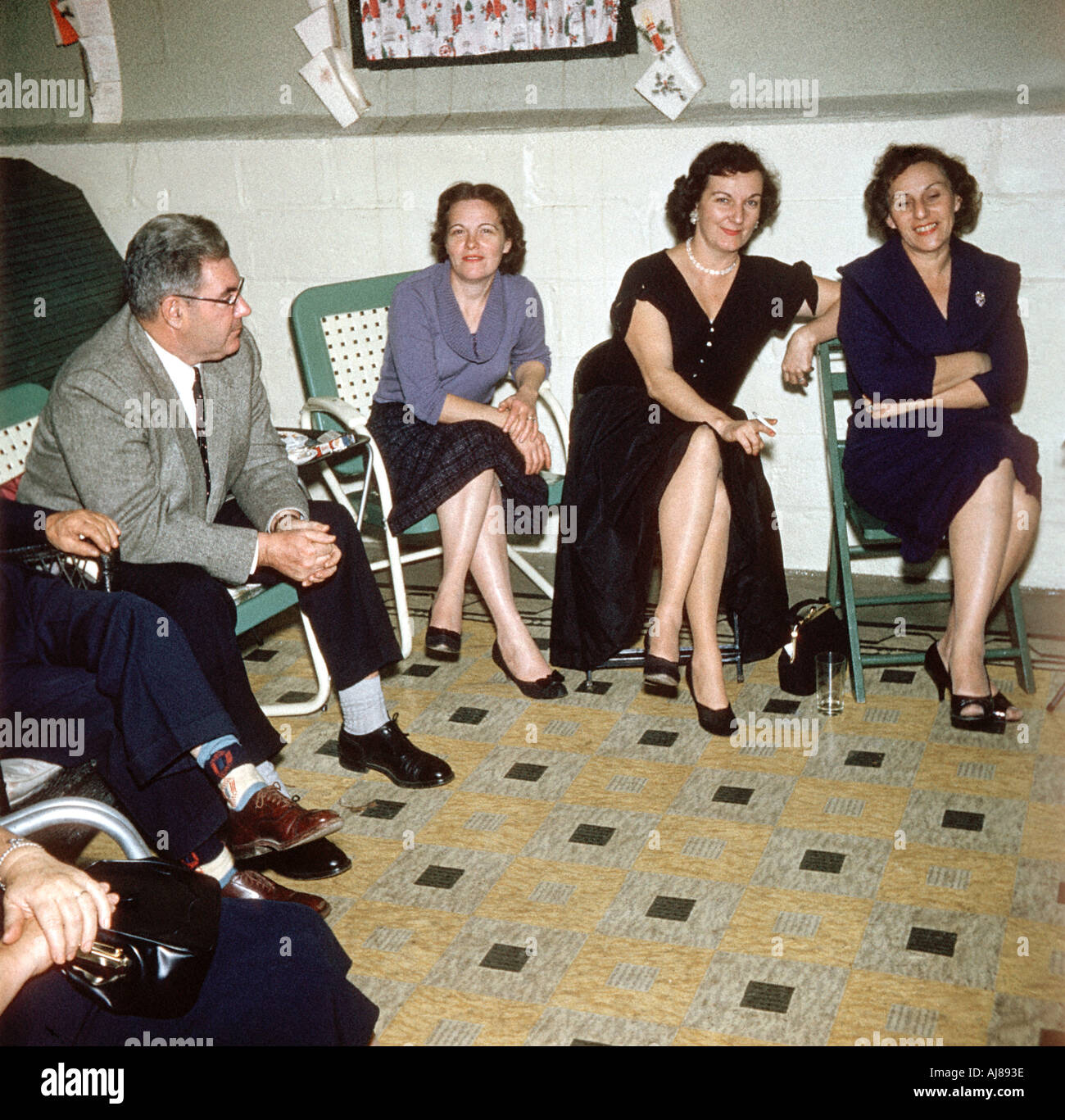1950s Vintage Family Photo, Adult Party in Home Basement party group old Women Sitting Together 'old family photographs' New Jersey women friends Stock Photo
